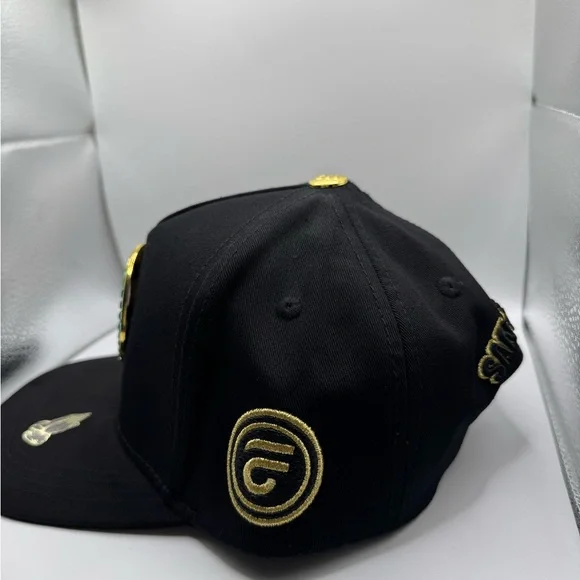 Black and Gold Men's Hat with Iconic Design